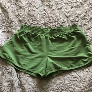 Green exercise shorts